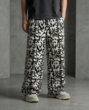 Urban Calligraphy Wide Leg Trousers CLAZZEY