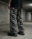Revolt Typography Wide Leg Trousers CLAZZEY