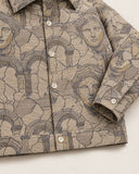 Cartograph shacket - buttoned hem band detail