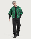Cybernetic Boxy-Fit Cuban Shirt worn open over a black long-sleeve with black baggy jeans