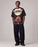 Dark Bloom printed relaxed tee full look with baggy trousers