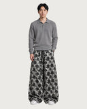 Geometric Symmetry baggy pants – full look on model