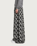 Geometric Symmetry baggy pants – side view