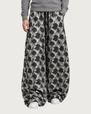 Geometric Symmetry baggy pants – walking