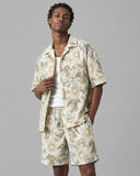 Ivory Botanica co-ord shirt worn open over a white tank