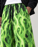 Neon Inferno baggy pants – print close-up