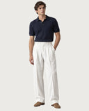 Alabaster White pleated wide-leg trousers - full look on model