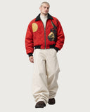 Red Wave Canvas fur-lined zip-up jacket – styled with cream knit and ecru trousers
