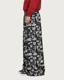 Revolt Typography baggy pants – side view