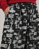 Revolt Typography baggy pants – print close-up