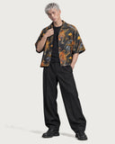 Rebellion Tiger Boxy-Fit Cuban Shirt worn open over a black tee with black wide-leg trousers