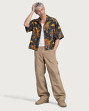 Rebellion Tiger Boxy-Fit Cuban Shirt worn open with tan carpenter pants